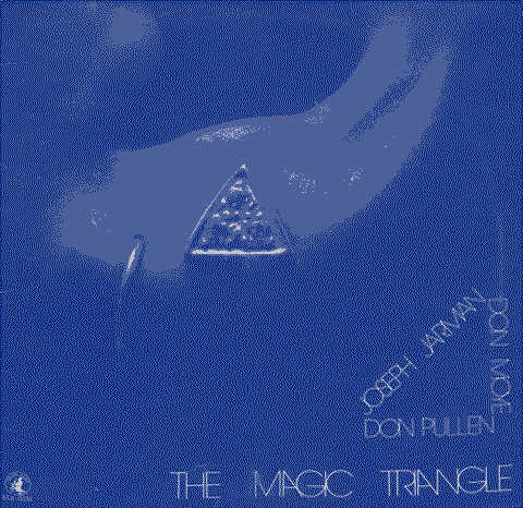 A close-up shot of a woman’s ear with a golden earring in a triangle shape, which is the cover of the album.